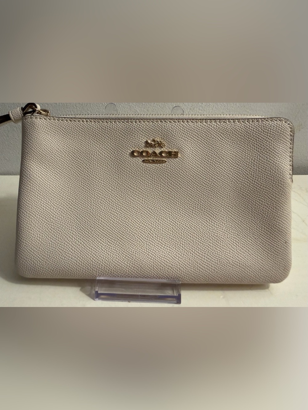 Coach Large Corner Zip Wristlet in the color Chalk White.